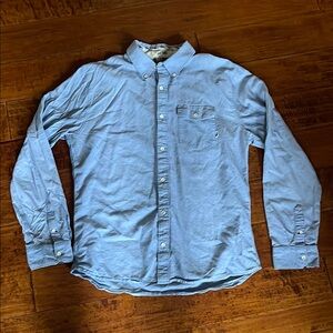 Vans button down blue shirt. Size XL. Great used condition.